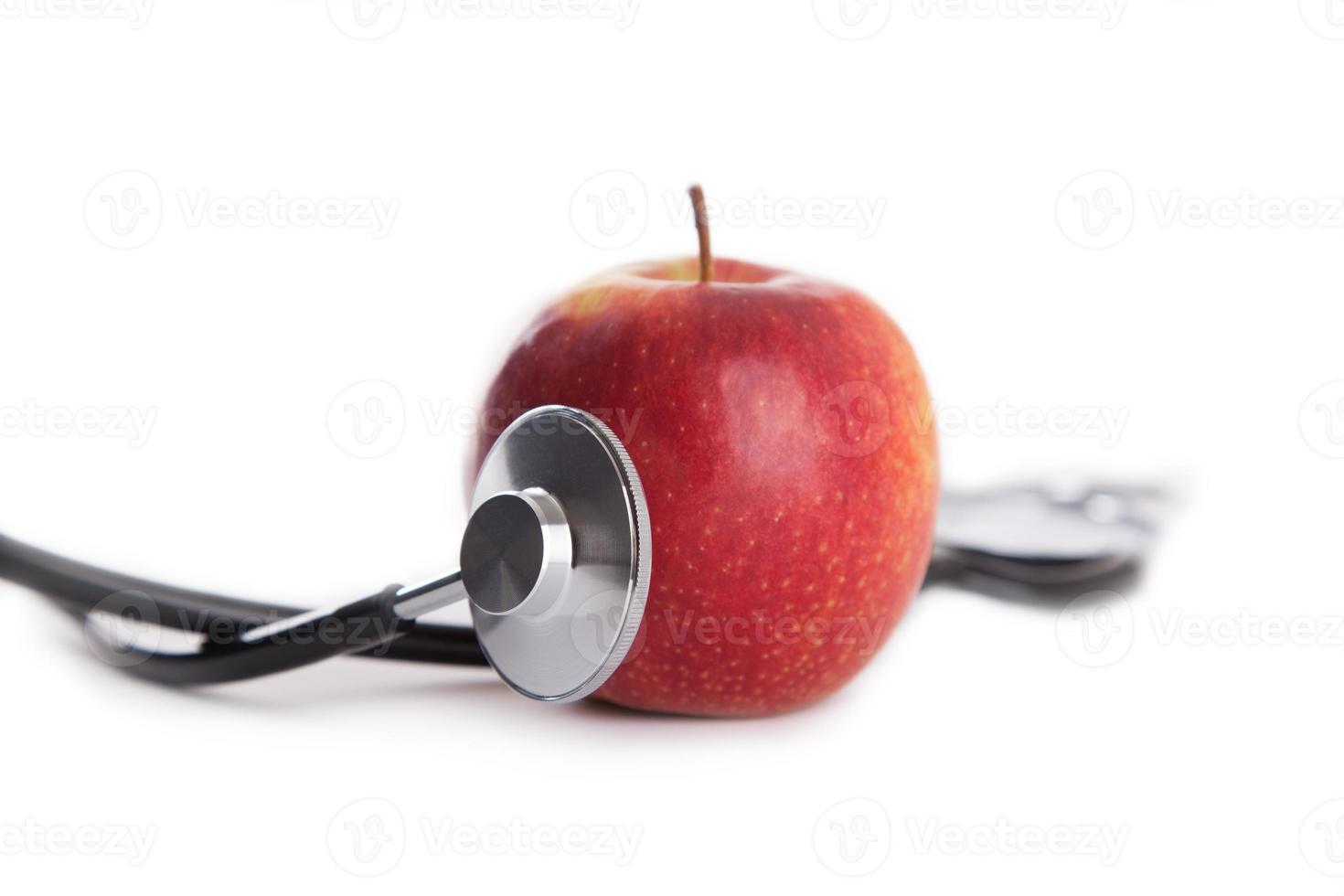 Apfel und Stethoskop foto