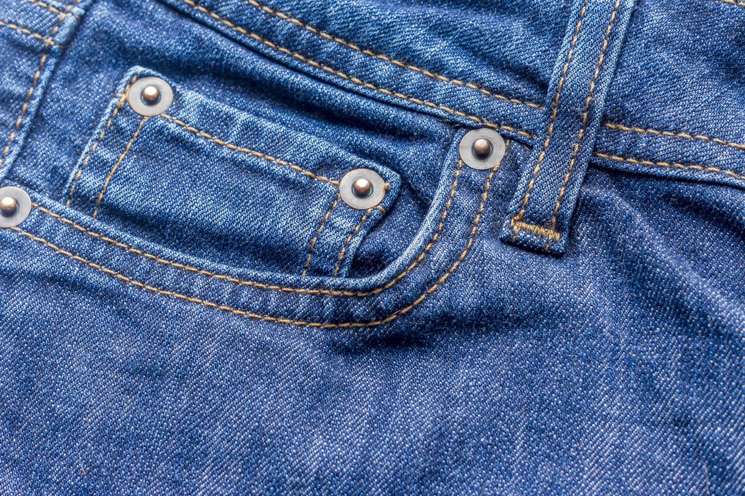 Denim-Hintergrund mit Tasche foto