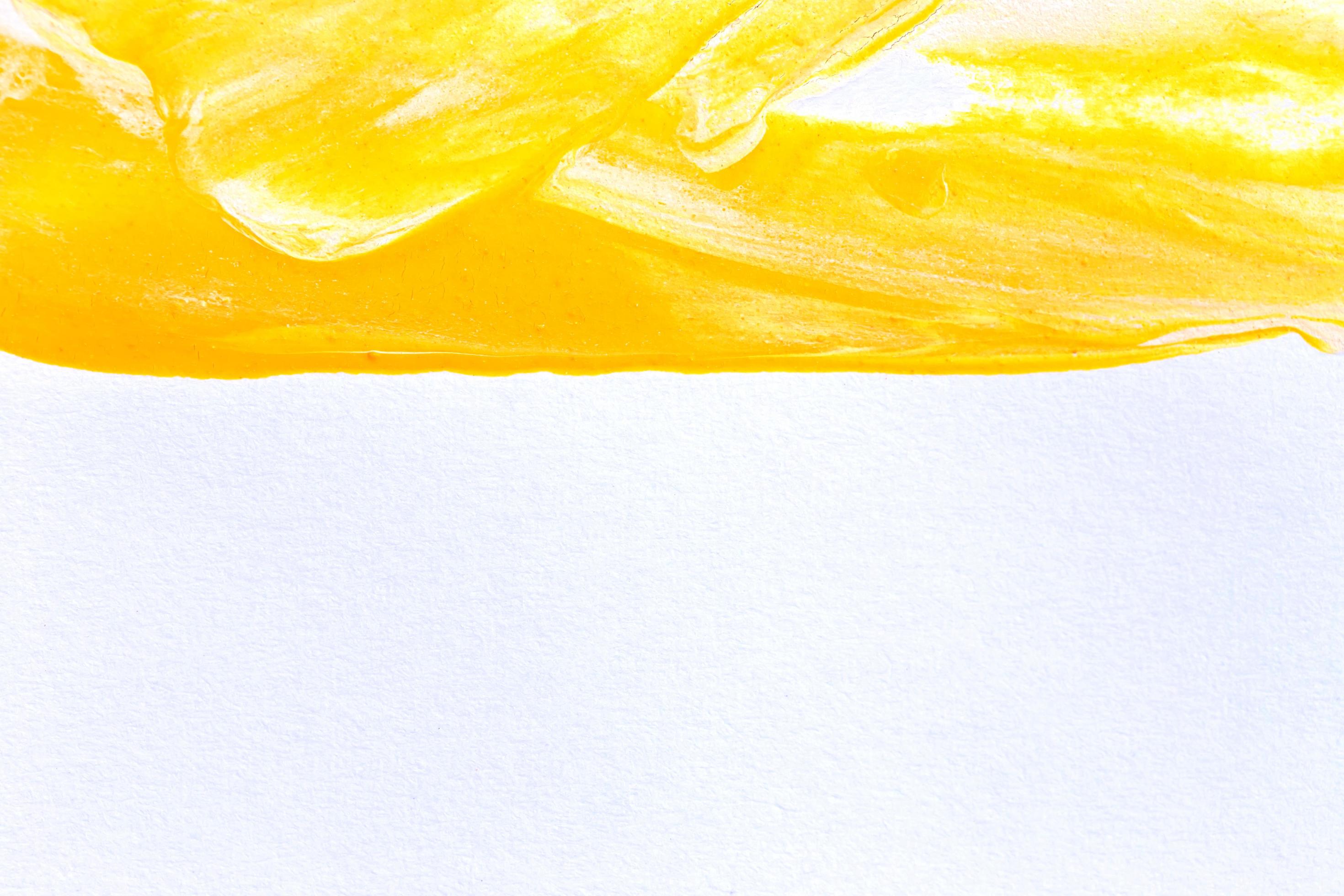 Pinselstrich Textur Hintergrund des gelben Aquarells foto