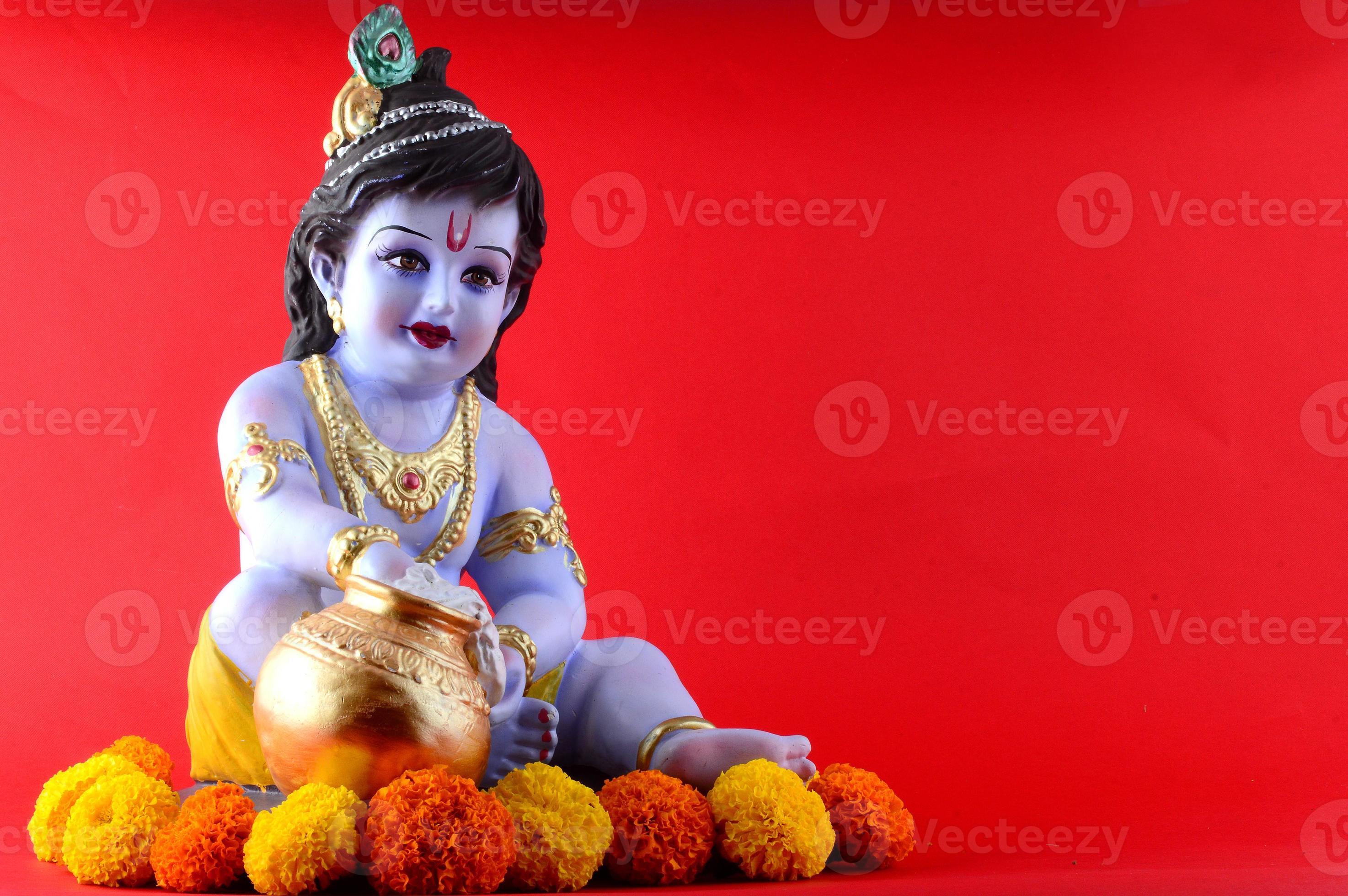 Hindu-Gott Krishna auf rotem Hintergrund foto