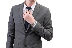 Geschäftsmann im grauen Anzug isoliert auf weißem Hintergrund. foto