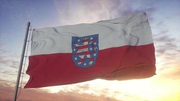 thüringen flagge, deutschland, weht im wind, himmel und sonnenhintergrund. 3D-Darstellung foto