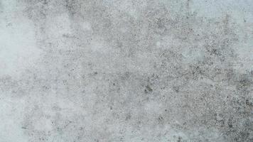 Schwarz-Weiß-Zementwand Textur Hintergrund, mörtelgraue Putzwand, Loft-Stil foto