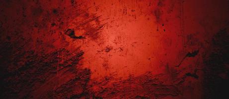 dunkelroter wandbeschaffenheitshintergrund. Halloween-Hintergrund beängstigend. roter und schwarzer Grunge-Hintergrund mit Kratzern foto