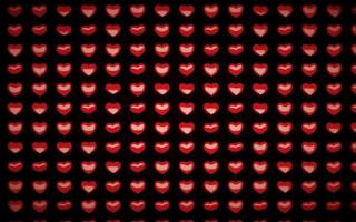 Urlaub Valentinstag Musterdesign mit 3D-roten Herzen auf schwarzem Hintergrund foto