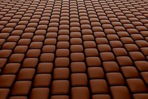 braune zuckerbeschichtete schokolade quadratische formmuster 3d-illustration foto