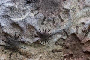 Alte Stein- und Felstexturen mit einigen Virusfossilien-Virenvisualisierungen foto