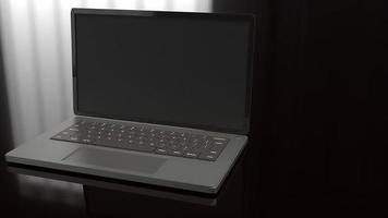 Laptop auf schwarzem Hintergrund 3D-Rendering. foto