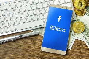 Libra Facebook und Bitcoin Kryptowährung für Libra Facebook-Inhalte foto