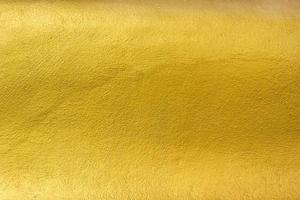 golden bemalte Wand, abstrakter Hintergrund foto