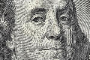 Benjamin Franklins Gesicht auf dem 100-Dollar-Schein der USA foto