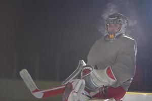 Eishockeyspieler auf der Bank foto