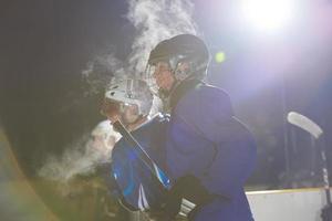 Eishockeyspieler auf der Bank foto