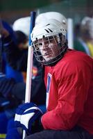 Eishockeyspieler auf der Bank foto