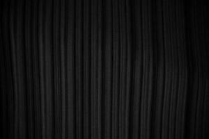 eleganter schwarzer stoff vertikaler texturhintergrund foto