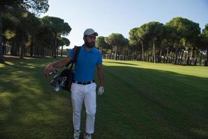 Golfspieler zu Fuß foto