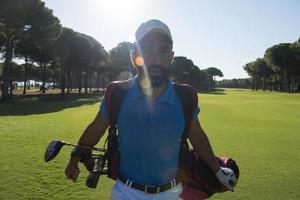 Golfspieler zu Fuß foto