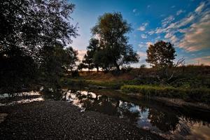 Sonnenuntergang und der Fluss foto