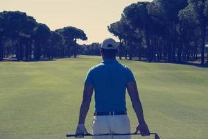 Golfspielerporträt von hinten foto
