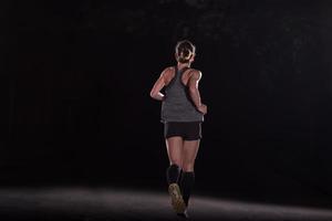 weibliches läufertraining für marathon foto