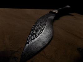 ein Messer mit Eisengravur foto