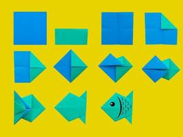 Schritt für Schritt Anleitung, wie man Origami-Fische macht. DIY für Kinder foto