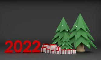 2022 geschenkbox, weihnachtsbaum zu weihnachten und neujahr auf schwarzem hintergrund foto