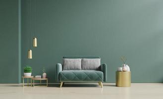 modernes minimalistisches interieur mit einem grünen sofa an einer leeren dunkelgrünen wand.