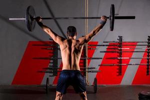 Langhantel Gewichtheben Mann Rückansicht Workout Gym foto