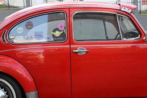 rotes klassisches volkswagen-autoauto foto