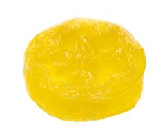gelbe durchscheinende runde Seife mit Luffa-Pflanze foto