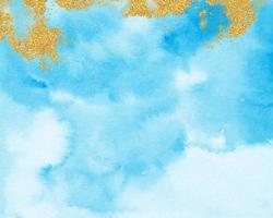 gold und blauer aquarellhintergrund, pastellblaue textur foto