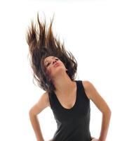 Partyfrau isoliert mit Wind im Haar foto