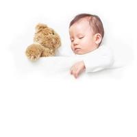 Asiatisches Baby, das mit ihrem Teddybär schläft, mit dem Wortlaut gute Nacht, träume süß foto