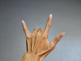 Signalisierung mit Fingern oder Symbolen foto