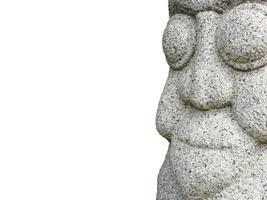 Nahaufnahme isoliert Asien Rock Statue Gesicht auf dem weißen Hintergrund. Beschneidungspfade foto