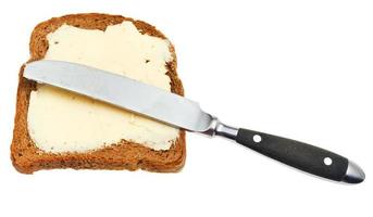 Brot- und Buttersandwich mit Tischmesser foto