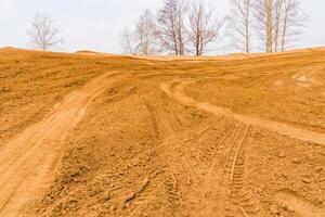 Radspur auf dem Sand foto