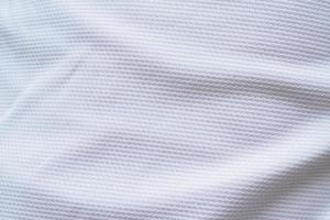 weißer fußball trikot kleidung stoff textur sportbekleidung hintergrund foto