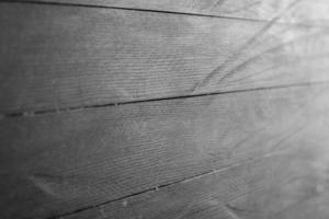 Vintage farbige Holzhintergrundtextur mit Knoten und Nagellöchern. alte bemalte Holzwand. hölzerne dunkle horizontale bretter. Vorderansicht mit Kopierbereich. foto