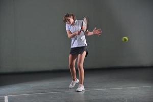 Porträt eines Tennismädchens foto