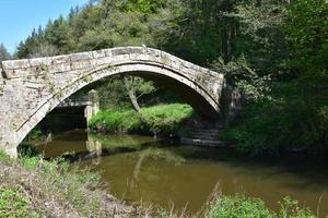 Steinbettlerbrücke eine historische Brücke in Glaisdale, England foto