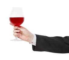 Seitenansicht des Rotweinglases in männlicher Hand foto