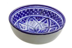 blaue Keramikschale auf weißem Hintergrund foto