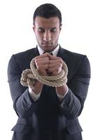 Geschäftsmann mit Seil isoliert auf weißem Hintergrund foto