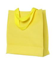 Gelbe Einkaufstasche aus Segeltuch isoliert auf weißem Hintergrund mit Beschneidungspfad foto