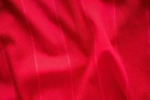 roter Sportbekleidungsstoff Jersey-Textur foto