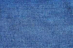 blaue Textur aus Denim-Stoff hautnah foto