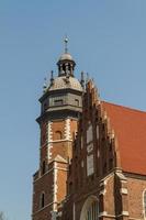 Krakau - Fronleichnamskirche wurde um 1340 von Kasimirus III. dem Großen gegründet. Die Vorderansicht hat einen gotischen Giebel, während die Innenausstattung barock ist foto