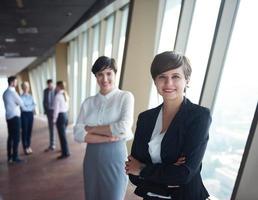 Geschäftsleute Gruppe, Frauen als Teamleiter foto